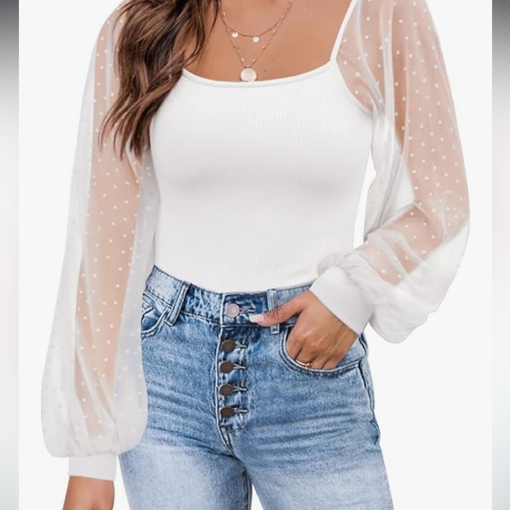 White top with sheer sleeves. Only worn once!😊